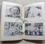 Soviet space memorabilia book with Vostok rocket photographs