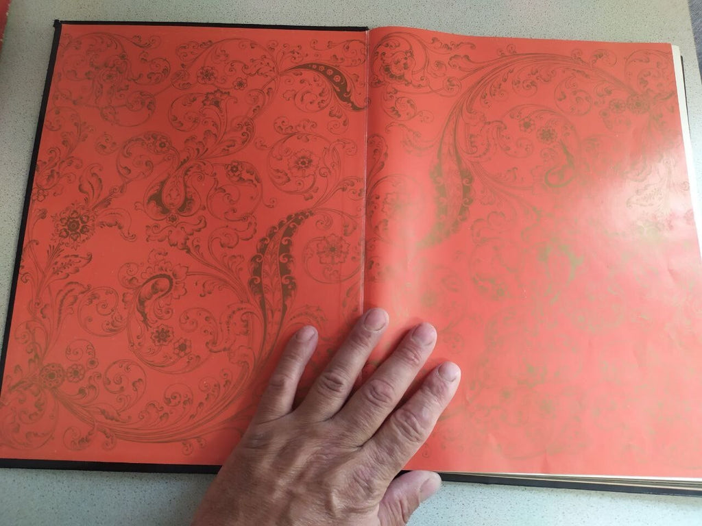 Soviet space memorabilia art album pages with gold lacquer-style colors
