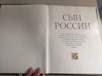 Palekh miniature art book spread from the life of Yuri Gagarin