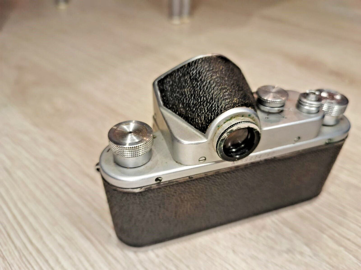 Original brown leather Zenit embossed case with strap