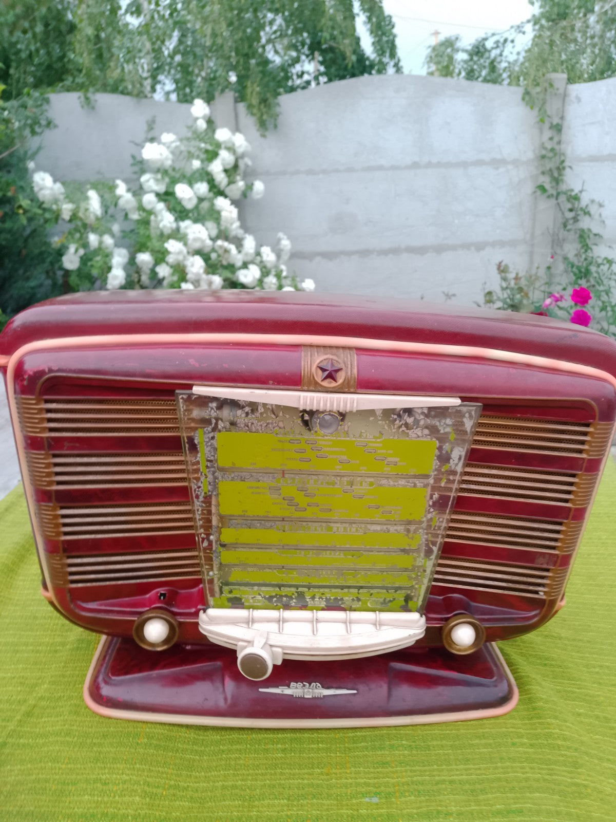 Mid-century USSR tube radio side view showing minor wear